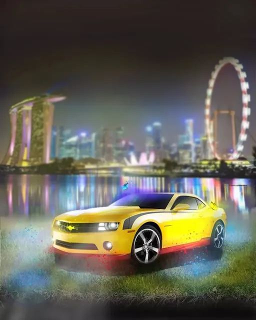 A yellow sports car lit from below on grass, against a night waterfront skyline with a ferris wheel.